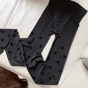 Chanel Fashionable Black Leggings with Logo Print