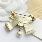 Chanel Delicate Bow Brooch with Pearl Drop