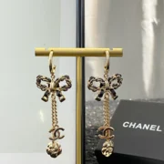 Chanel Exquisite Bow Drop Earrings with Camellia