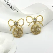 Chanel Sparkling Bow Star Earrings