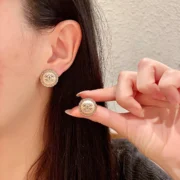 Chanel Unique Button Stud Earrings