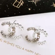 Chanel Elegant Pearl Stud Earrings