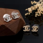 Chanel Elegant CC Stud Earrings - Silver/Gold