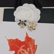 Chanel Graceful Camellia Bow Earrings
