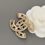 Chanel Luxurious Gold Tone Camellia Brooch with Crystals