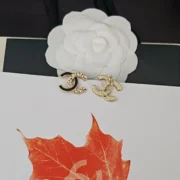 Chanel Classic Camellia Earrings Gold Black