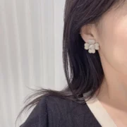 Chanel Unique Flower Earrings - CC Logo
