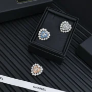 Chanel Elegant Blue and Rose Gold Heart Earrings
