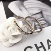 Chanel Fancy Hoop Earrings with CC Logo