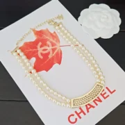 Chanel Elegant Pearl Necklace with Gold Bar