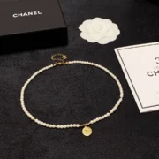 Chanel Fancy Pearl Necklace with Gold Charm