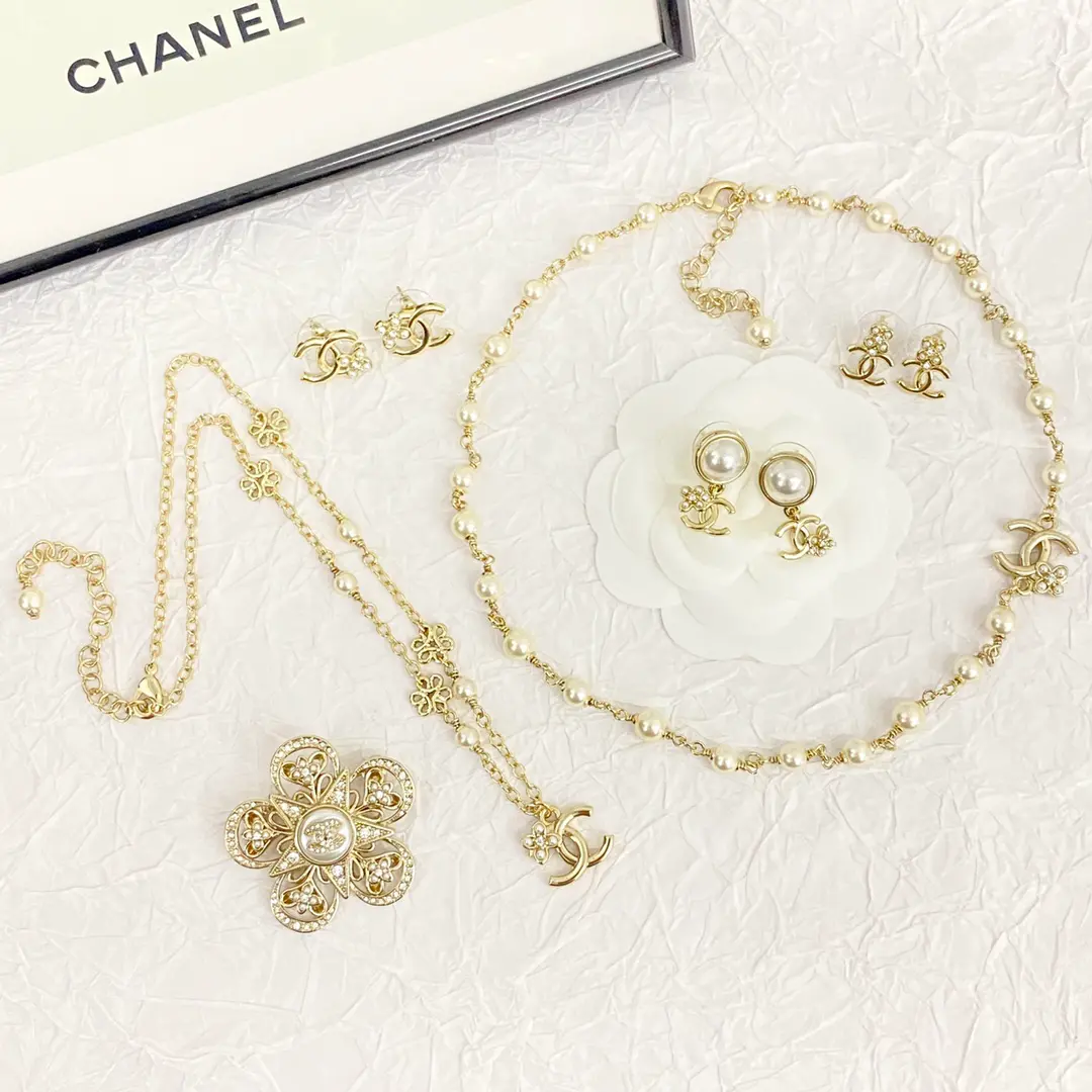 Chanel Enchanting Pearl and Gold Necklace Set