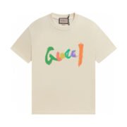 Gucci: Beige Brushstroke Logo Artistry