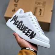 McQueen: Classic White Sneakers