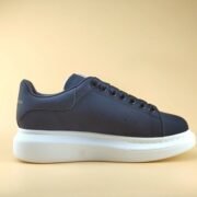 Unknown: Stylish Black Sneakers