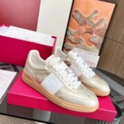 Valentino's Luxurious Gold Sneakers